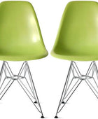 Juego de cuatro (4) sillas de comedor modelo Eames con patas de madera en color