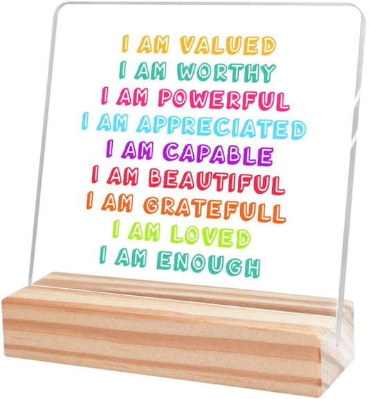 Decoración inspiradora de escritorio, con texto en inglés "I am Valued I am...