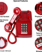Teléfono fijo rojo tradicional, teléfono con cable retro con indicador de...