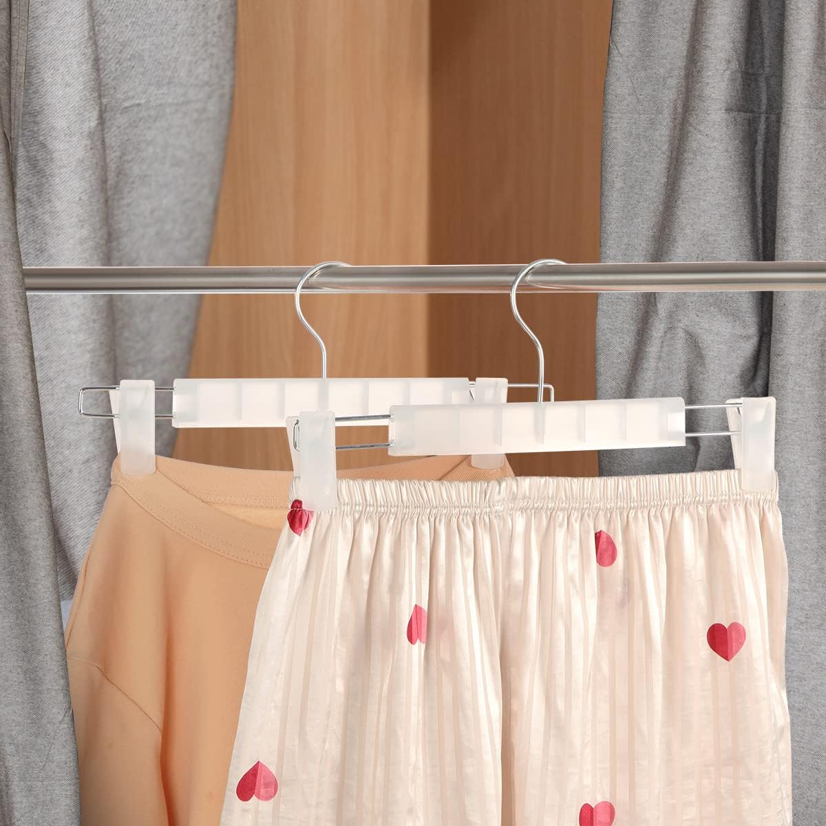 Perchas para pantalones, soportes para faldas que ahorran espacio con ganchos...