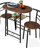 Conjunto de mesa redonda y sillas de madera