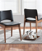 Afton Juego de sillas de comedor de 2 piezas tapizadas de piel sintética negra