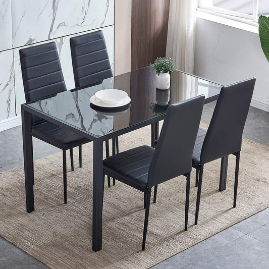 Juego de mesa de comedor con 4 sillas acolchadas de piel sintética, color negro