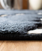SAFAVIEH Manhattan Collection - Alfombra de área de 6 x 9 pies, negro, hecha a...