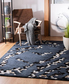 SAFAVIEH Manhattan Collection - Alfombra de área de 6 x 9 pies, negro, hecha a...