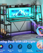 Escritorio para juegos de 78.8 pulgadas con luces LED, gabinete y estantes de